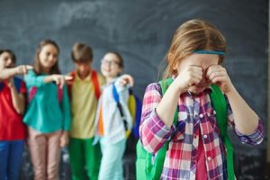 Child being bullied by other children